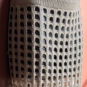 Cream-colored loose-knit sarong-style skirt/cover-up